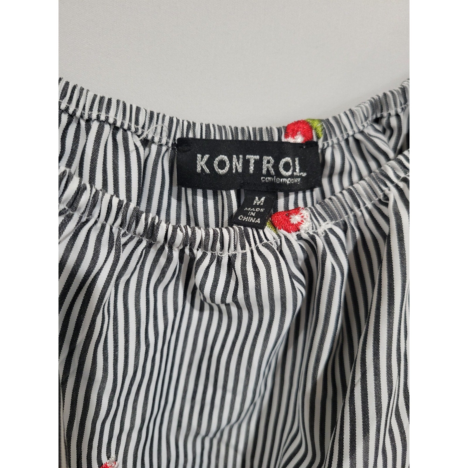 Kontrol Contemporary women's embroidery Roses & smocked tie- up waist blouse