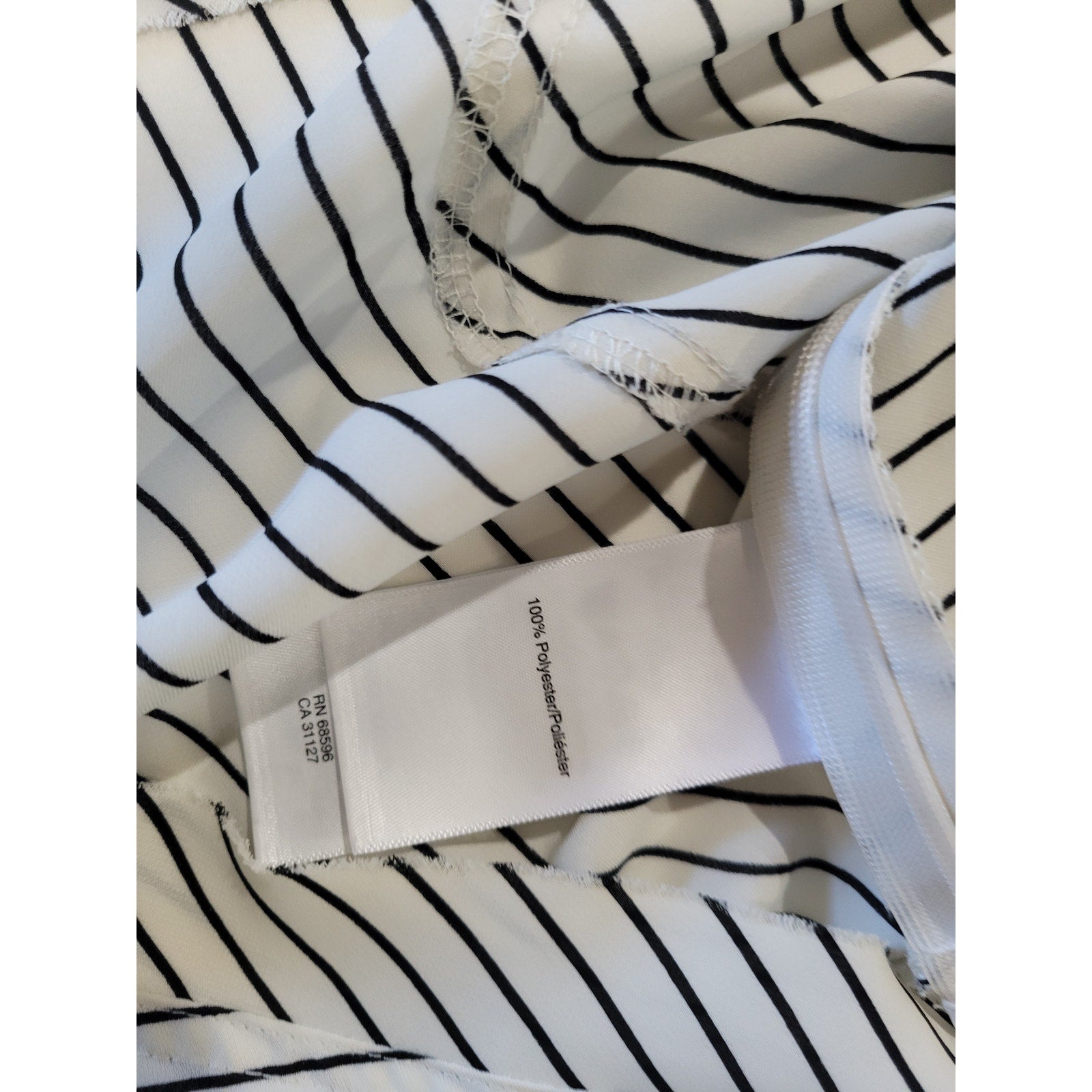 DKNY Women’s Ivory and Black Striped Sleeveless Peplum Blouse – Size 10