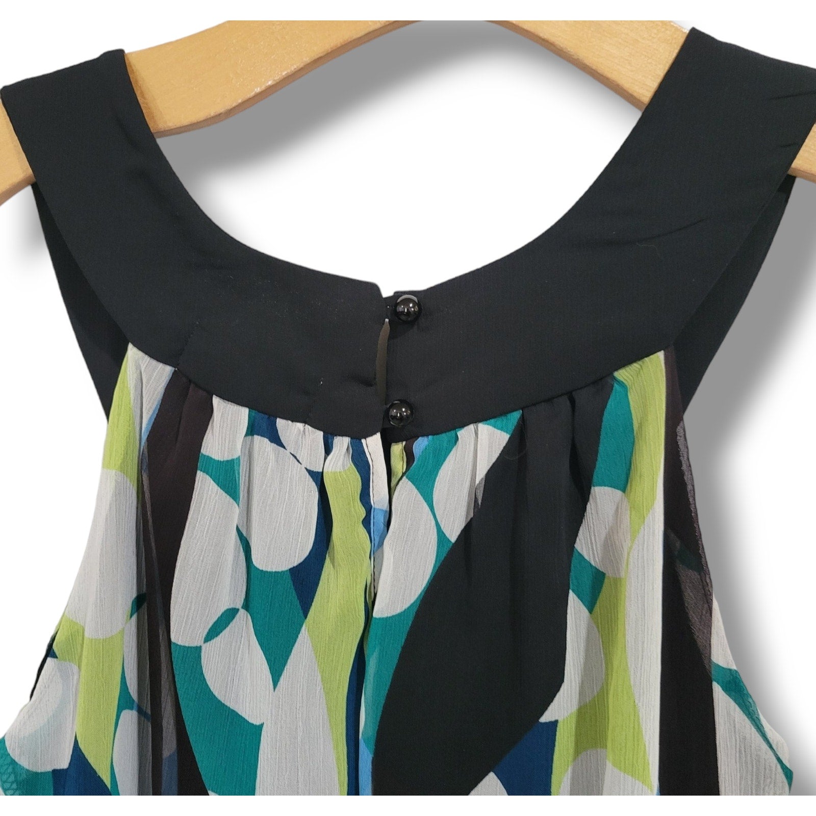 Trixxi Clothing Co.  Women's multicolor sleeveless Smocked waistband blouse