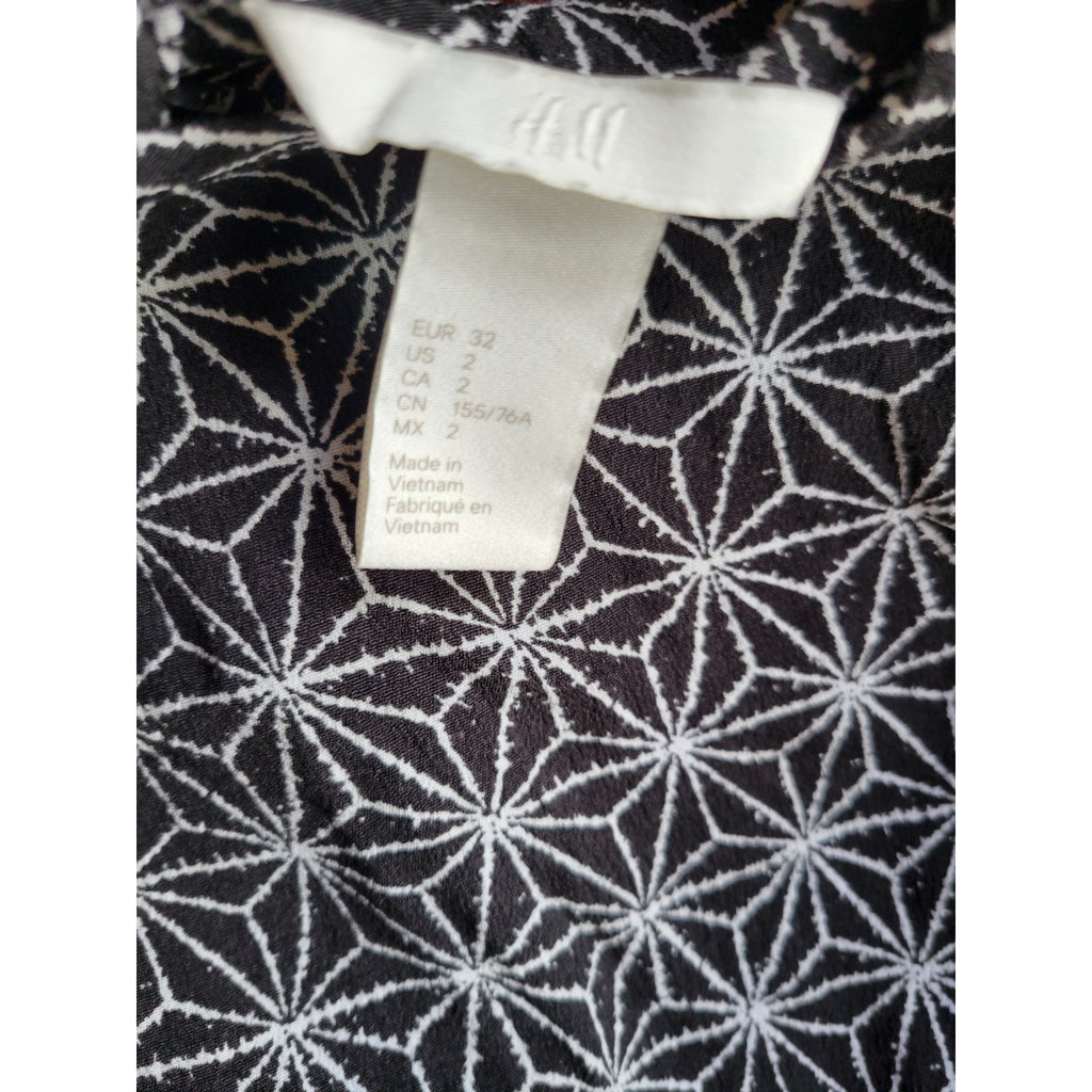 H&M Women’s Black Star Print long sleeve button back Blouse - sz 2