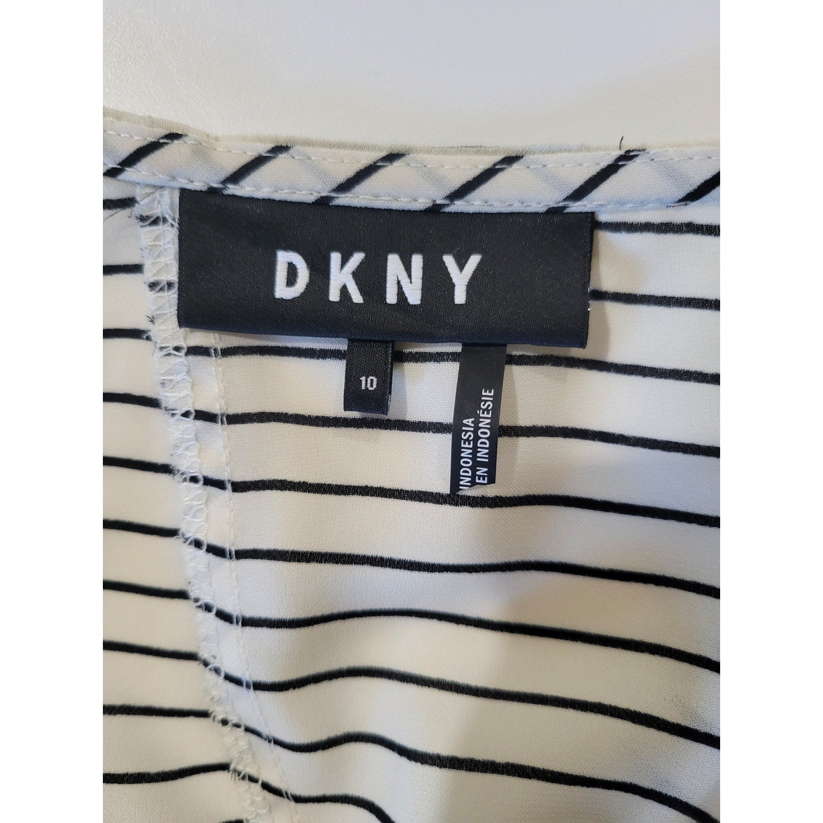 DKNY Women’s Ivory and Black Striped Sleeveless Peplum Blouse – Size 10