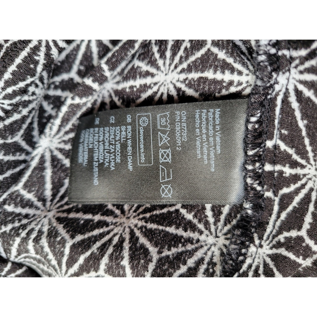 H&M Women’s Black Star Print long sleeve button back Blouse - sz 2