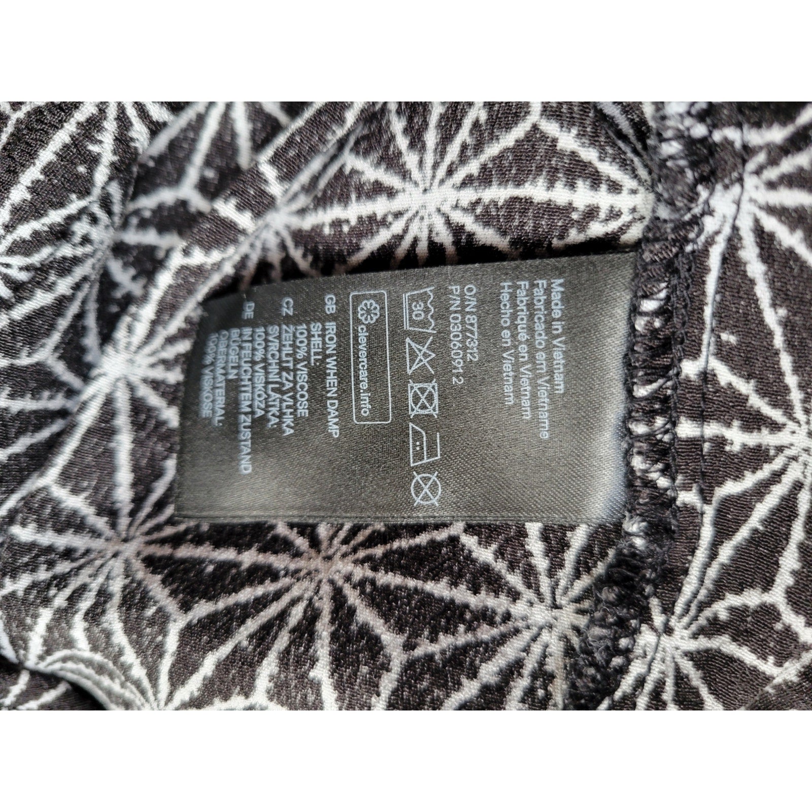 H&M Women’s Black Star Print long sleeve button back Blouse - sz 2