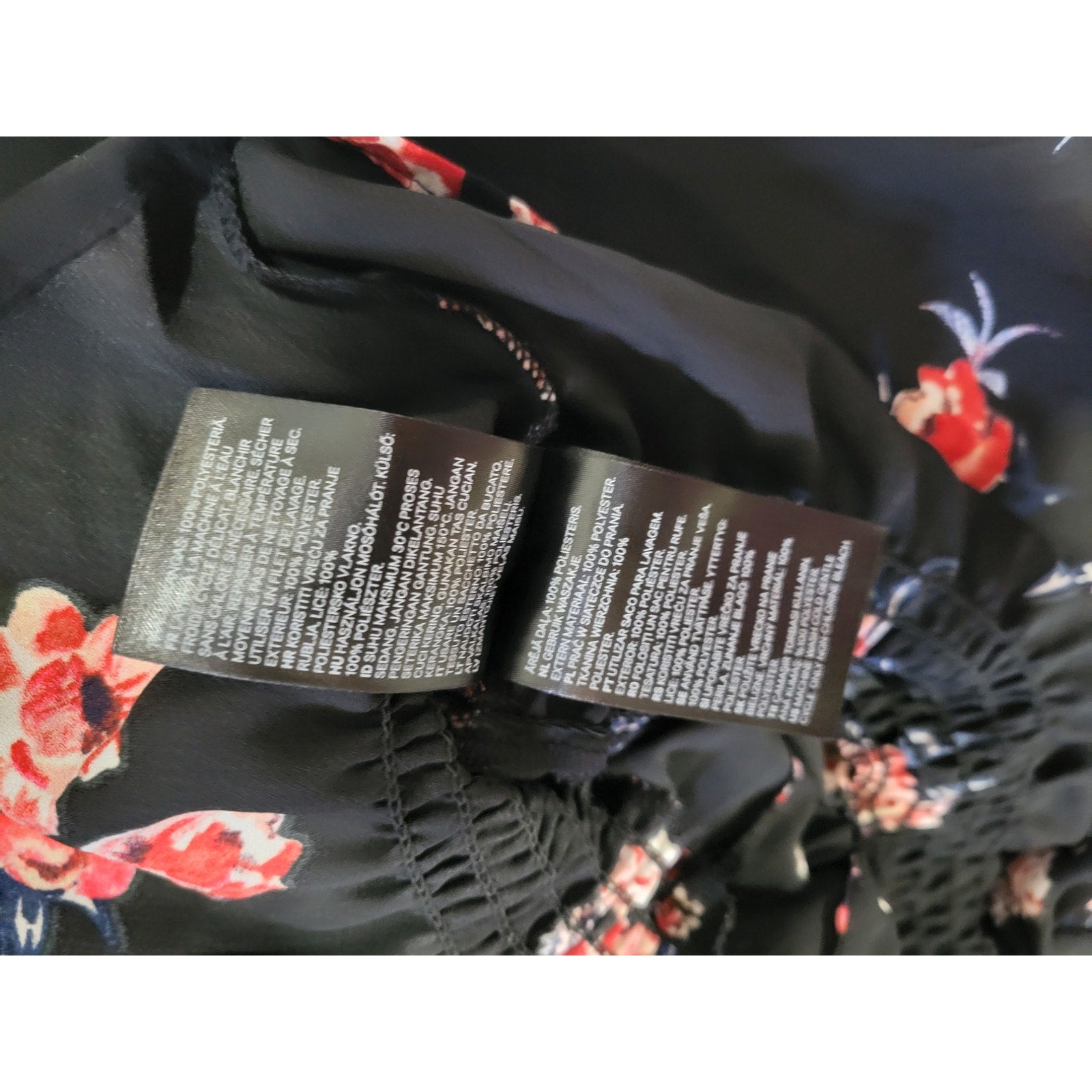 Divided by H&M Black Floral Lace-Up Smocked Blouse – Size 4 gently used